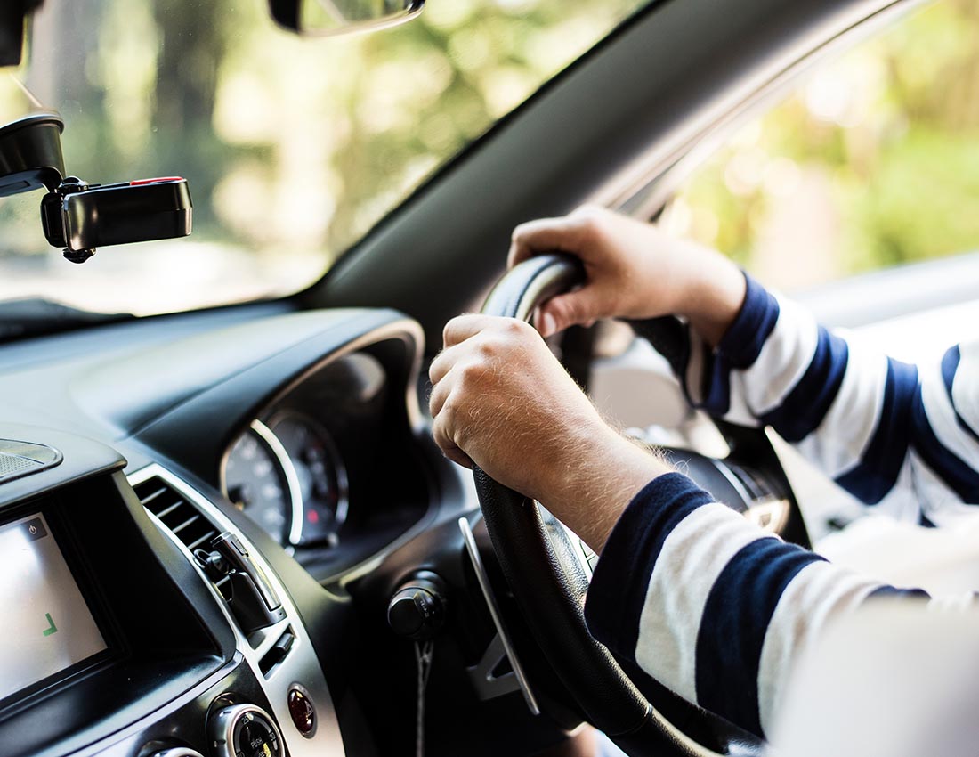 Man driving a family car