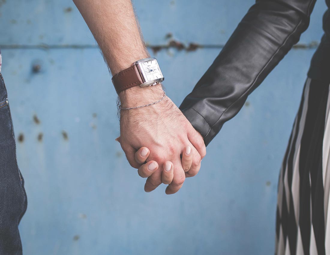 Man And Woman Holding Hands